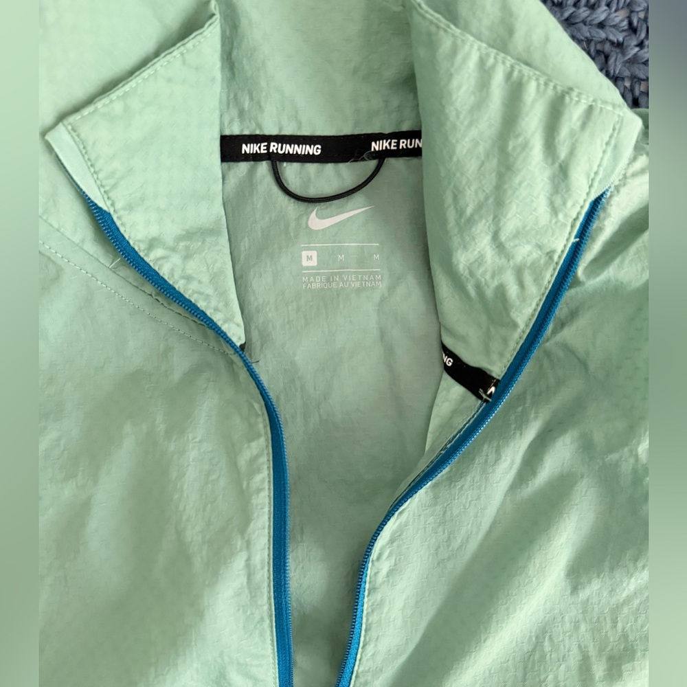 Nike Mint Green Windbreaker with Blue Zipper